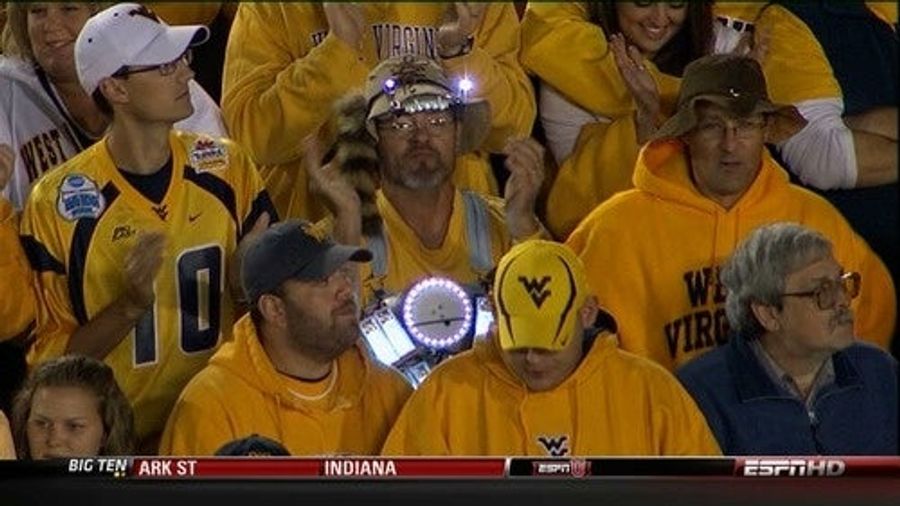 Time-Traveling Hillbilly Arrives Too Late To Warn Crowd About Spread Offense