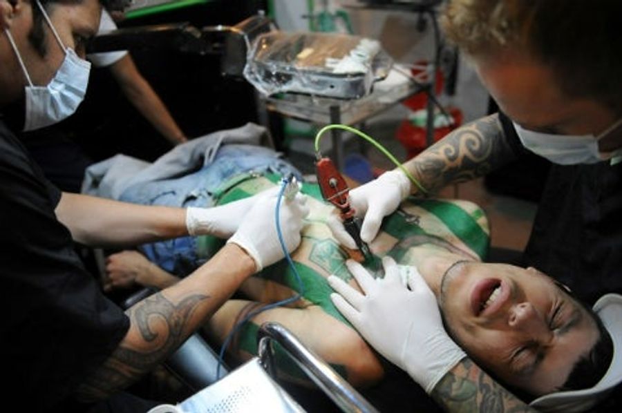 Man Gets Full Football Jersey Tattoo To Honor Team Icon