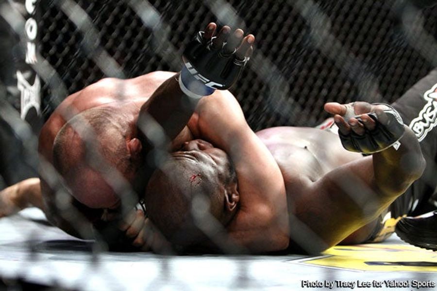 UFC 118: Boxing's Fat Fool Goes Down, And UFC's Juggernaut Rolls On, Now With Tits And Air Cannons