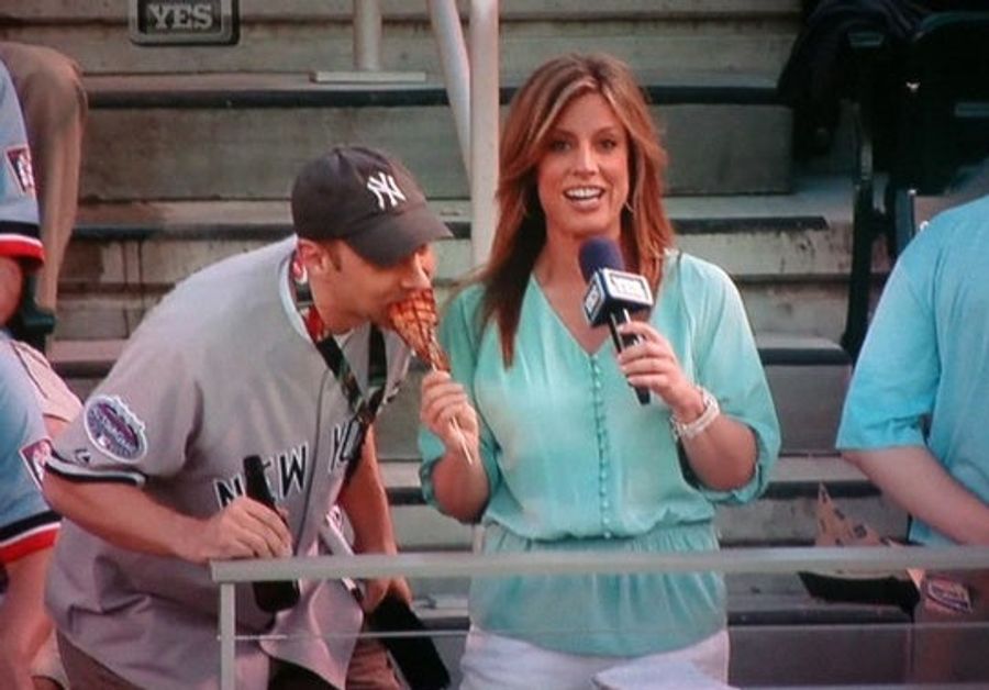 YES Reporter Loses Her Pork Chop To Hungry Fan