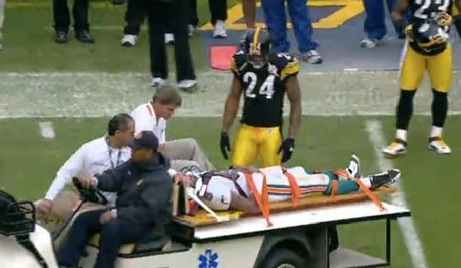 Pat White Carted Off After Helmet-To-Helmet Hit (Update)