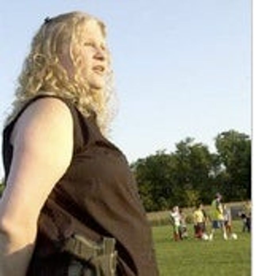 Gun-Toting Soccer Mom Shot By Gun-Toting Husband