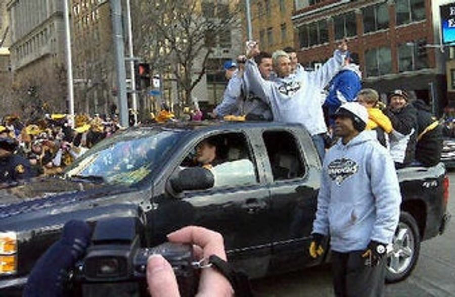Guys With Trophy Snarl Downtown Traffic, Film At 11