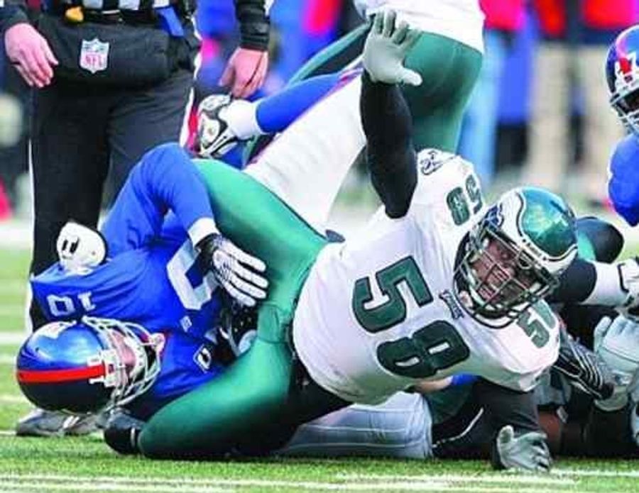 Young Eli Manning Can't Overcome His Bad Touch