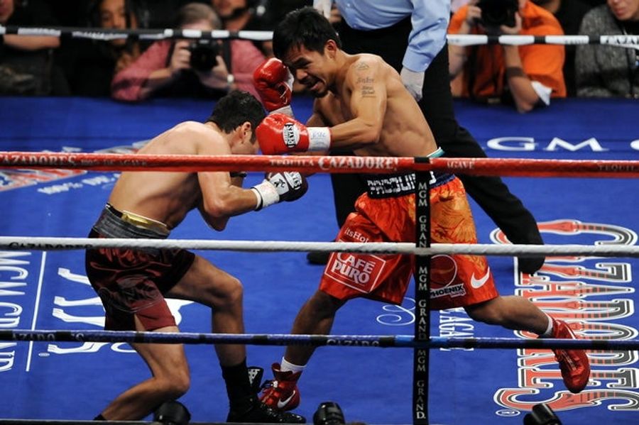 Pacman Destroys A Listless De La Hoya