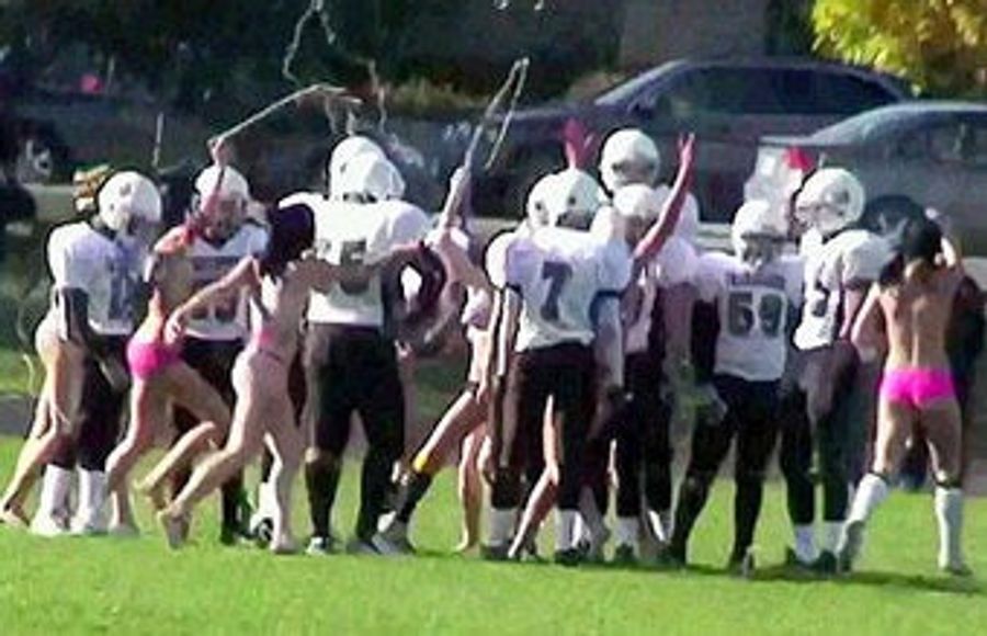 Cheerleaders Show School Spirit Through Streaking