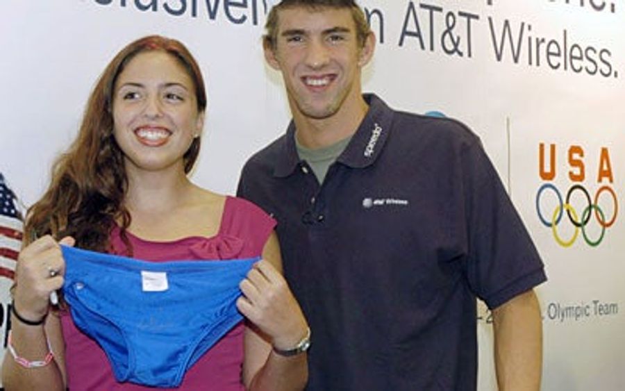 Michael Phelps' Propensity for Ho-Clocking Follows Him Everywhere