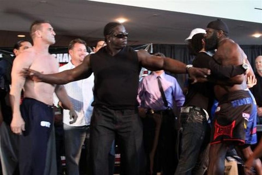 Kimbo Clashes With Ken Shamrock, Gina Carano Likely To Stay Clothed