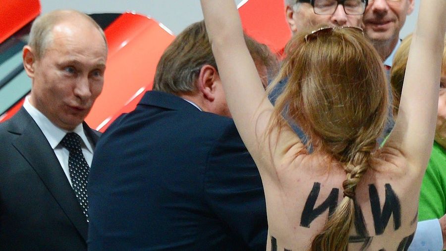 Vladimir Putin Was Confronted By A Topless Protestor, And He Really, Really Liked It