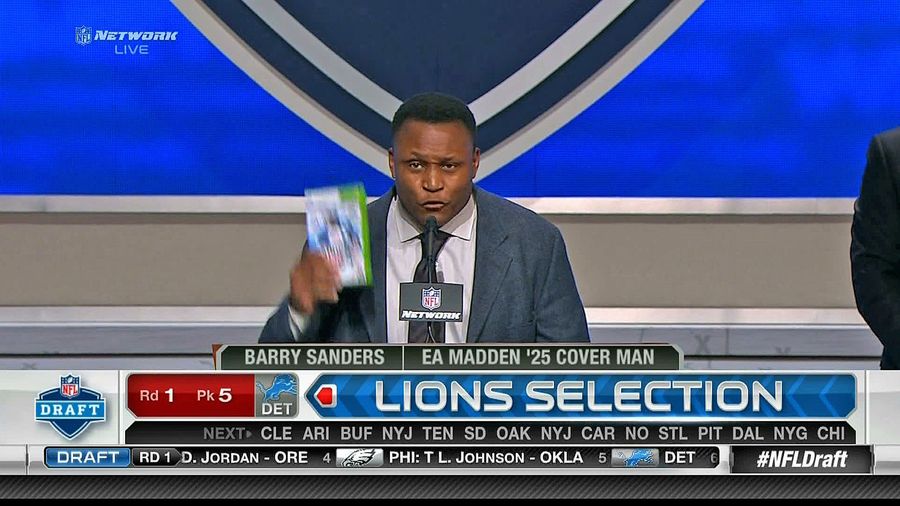 A Frumpily Attired Barry Sanders Demands You Buy His Video Game