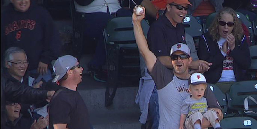 Man Catches Foul Ball While Holding Baby