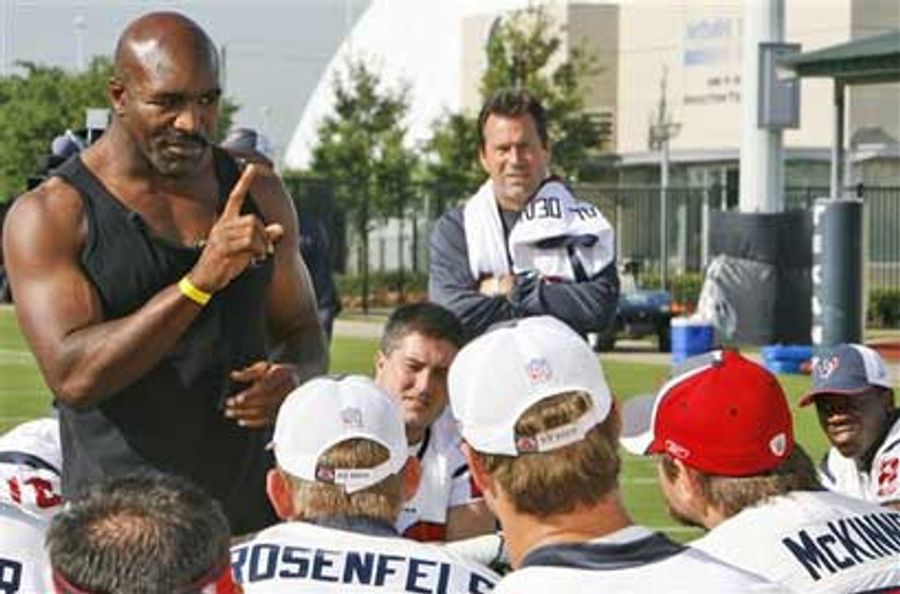 Evander Holyfield Has Much Advice For Sage Rosenfels