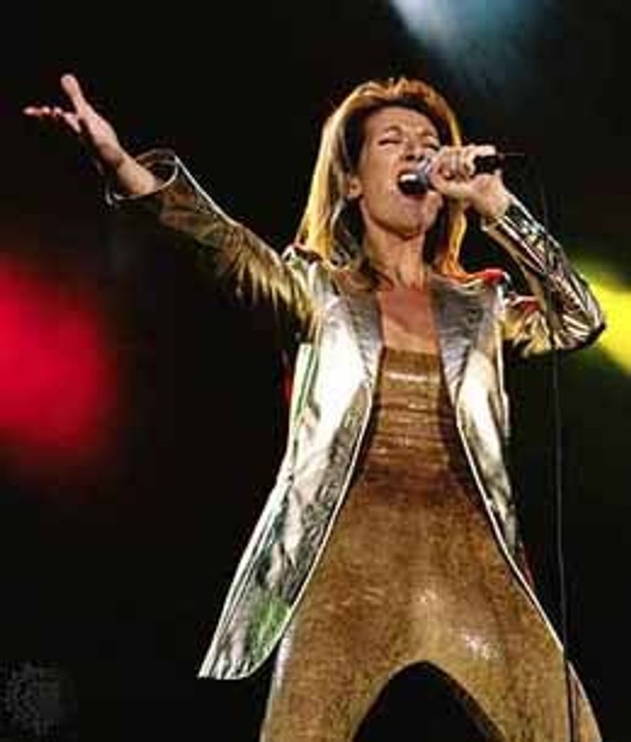 Celine Dion Will Heal Olympic Rifts With Powerful Vocals