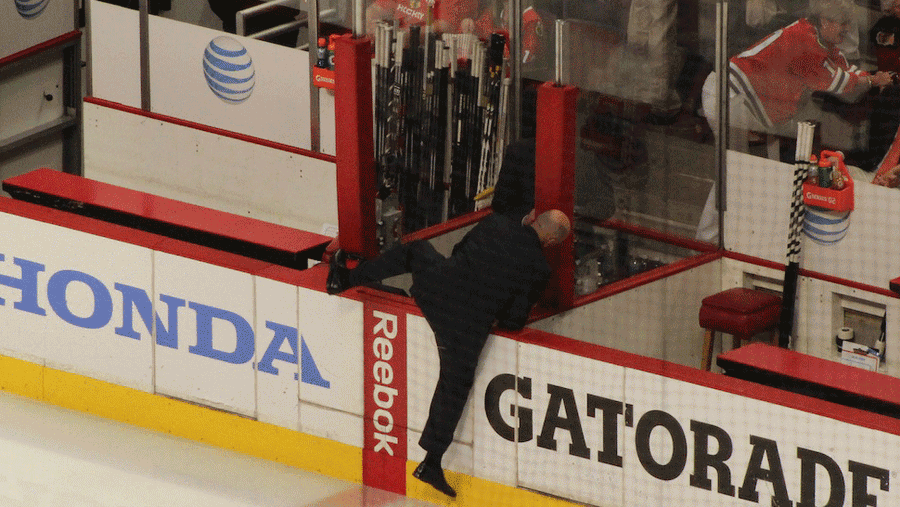I Can't Stop Looking At These Pics Of Pierre McGuire Scaling The Boards