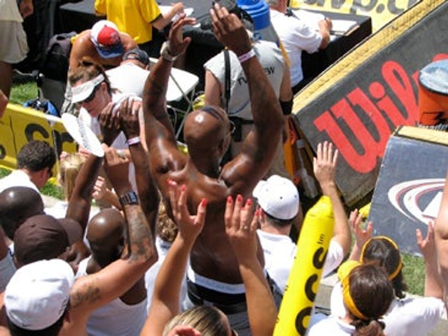 Could Someone Please Tell The Crazy Man With The Head Tattoo To Stop Doing The Wave? He's Blocking Our View.