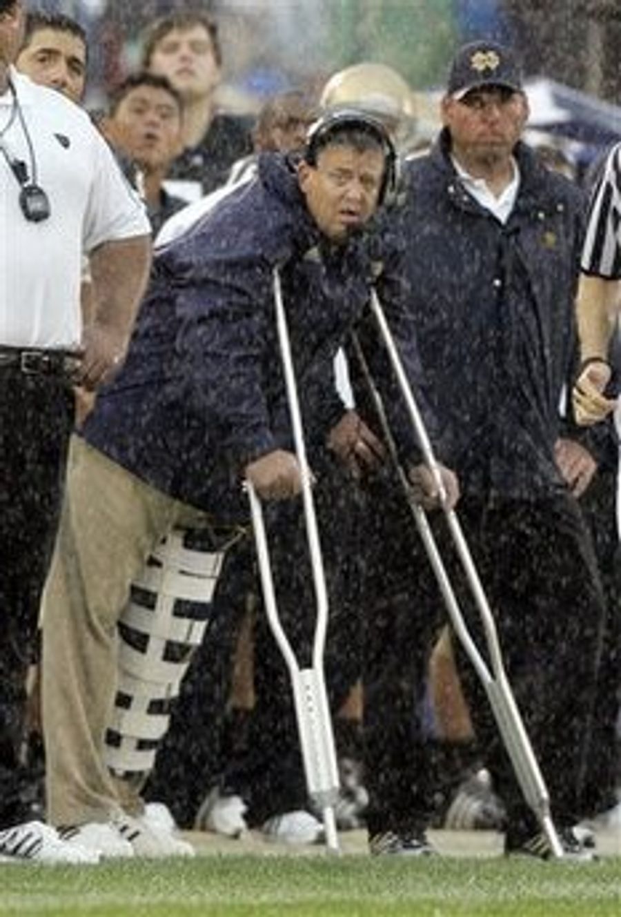 Charlie Weis Tears Two Ligaments in Knee While Simply Standing Around