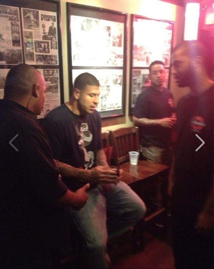 Here's A Photo Of Aaron Hernandez Getting Kicked Out Of A Bar