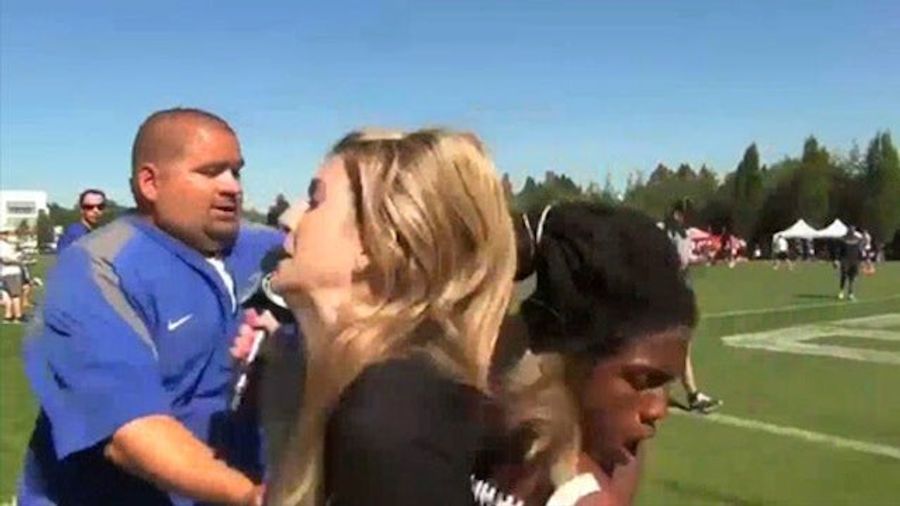 Reporter Gets Run Over By Football Player While Conducting Interview