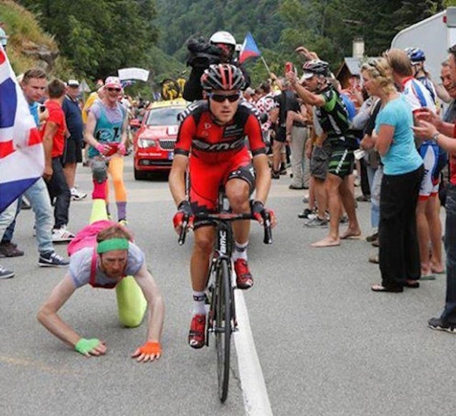 Spectator Picks Wrong Day To Run Alongside Tour de France Cyclist
