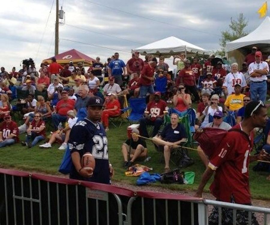 Dipshit Wears Cowboys Jersey And Yankees Cap To Redskins Camp
