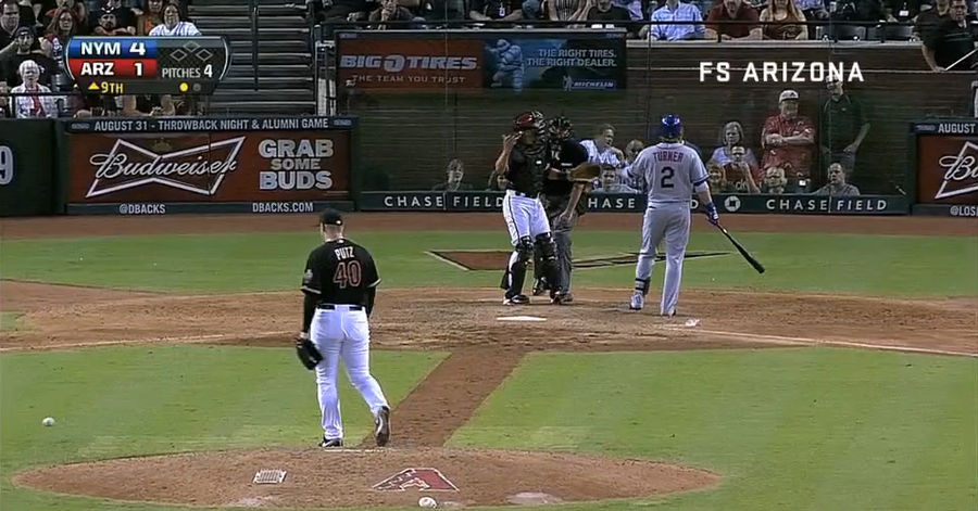 J.J. Putz Gets Interrupted By "Kickstart My Heart," Spikes Ball