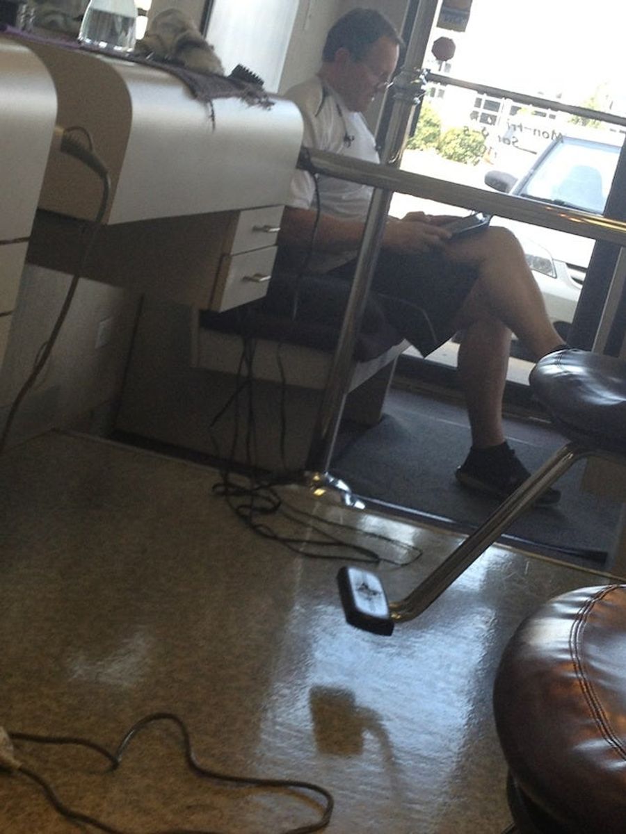 Here's Ed Hochuli In Suburban Chicago, Waiting On A Haircut
