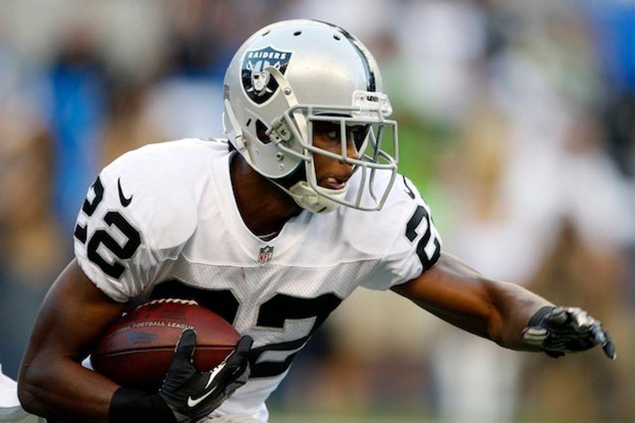 Let's Watch The Raiders' Taiwan Jones Jump Over A Car For $200