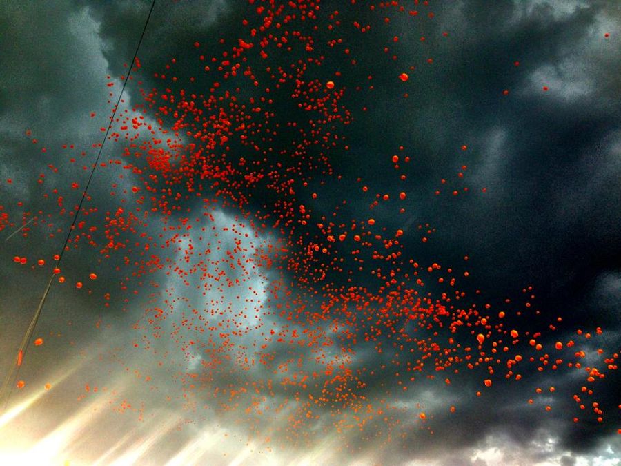 Balloon Release And Thunderstorms Make For Striking Eye Candy