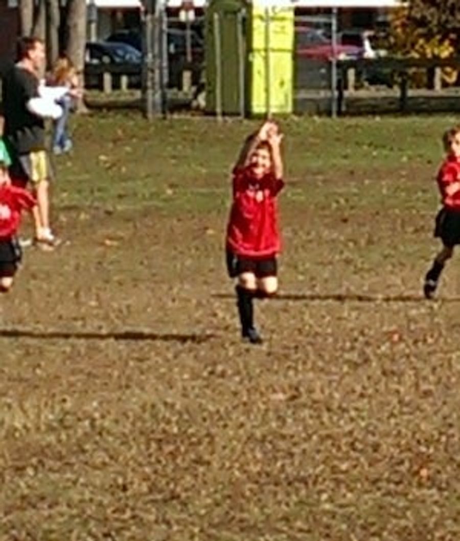 This Photo Of A Kid Making It Rain After Scoring Is Just Adorable