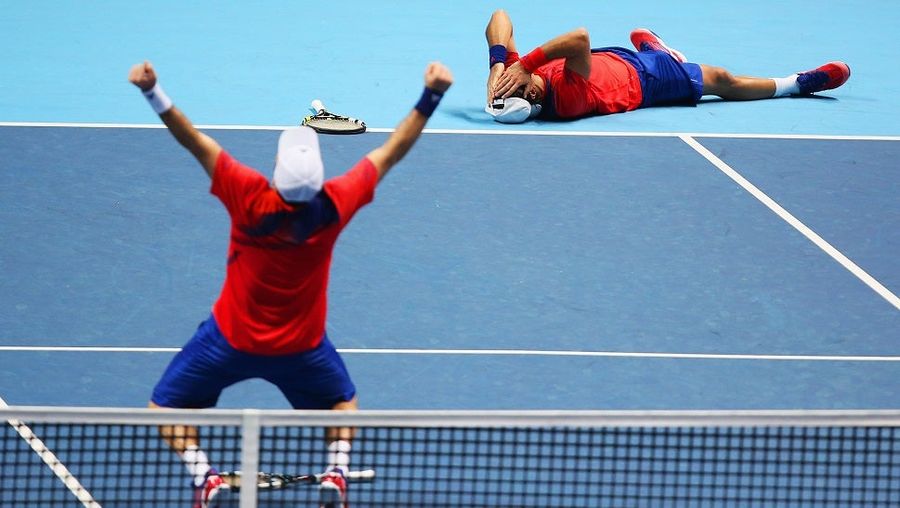 The Jubilance And Trauma Of Victory Displayed On One Tennis Court