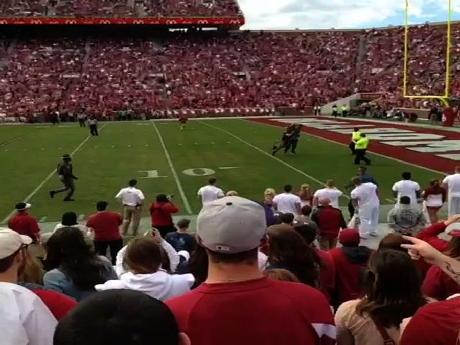 Watch An Oklahoma Idiot On The Field Get Leveled By State Trooper