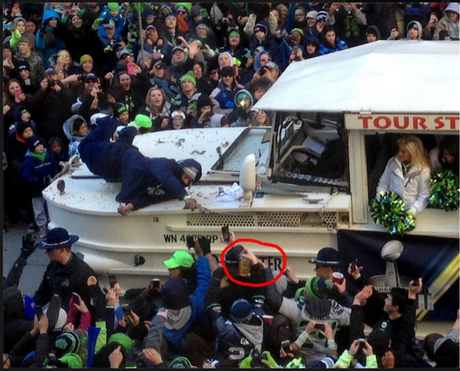 Marshawn Lynch Reaches For A Bottle Of Fireball At The Seahawks Parade