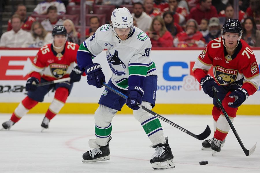 J.T. Miller, Canucks sink Panthers in overtime