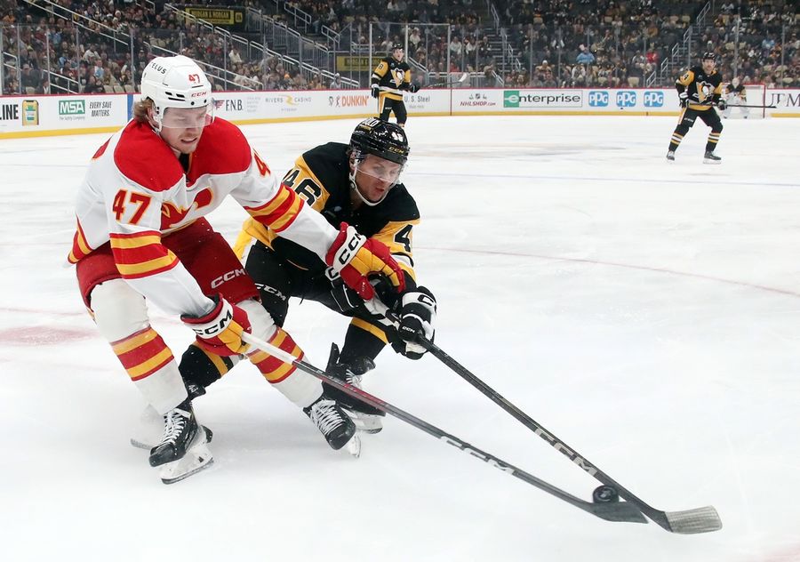 Penguins build 5-goal lead, coast past Flames