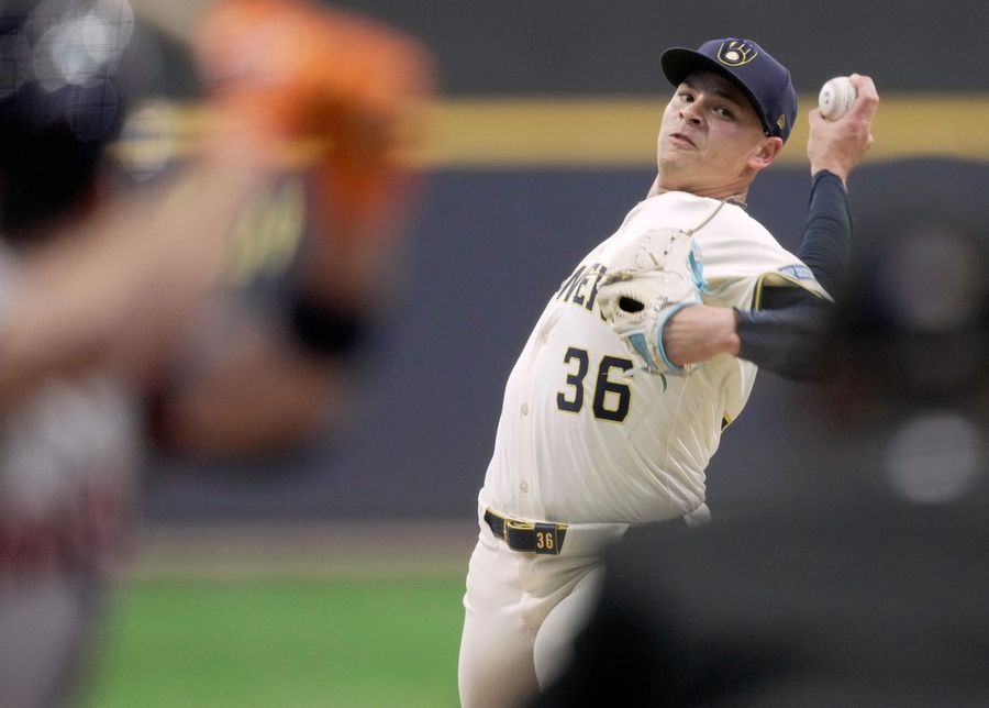 Brewers muscle past Astros to open three-game set