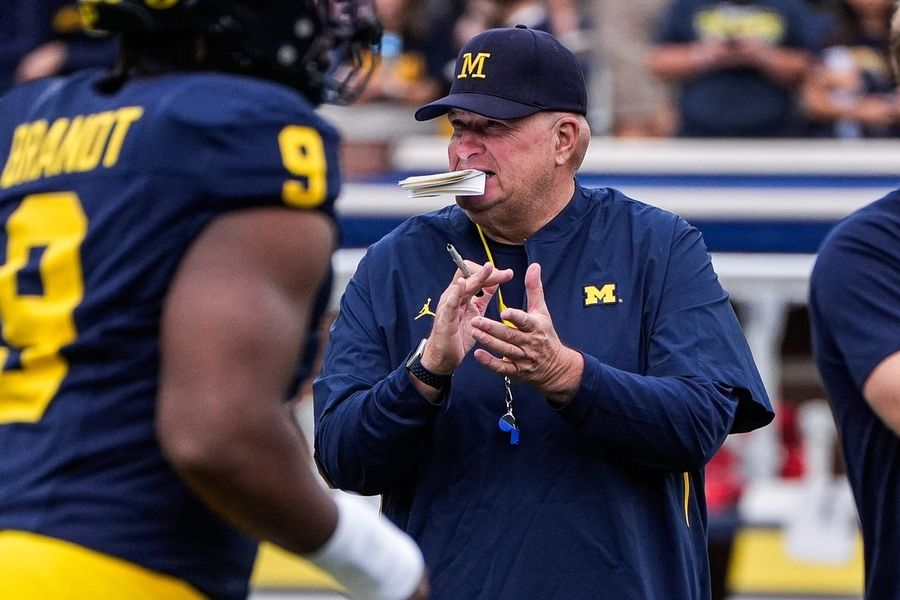Michigan's players 'feel very betrayed,' says interim coach Biff Poggi