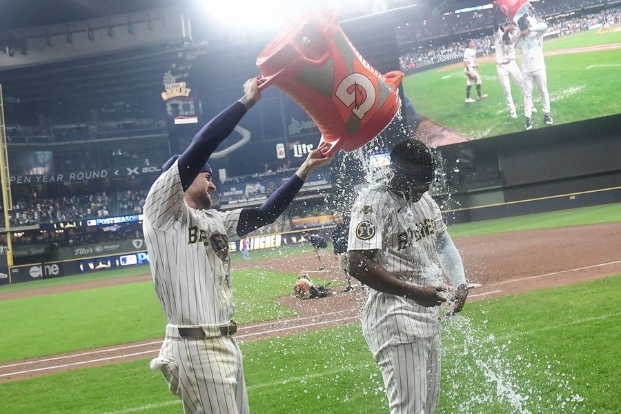 After clinching playoff berth, Brewers face Cardinals again