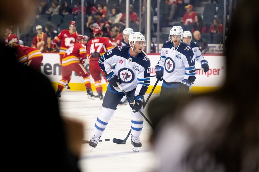 Jonathan Toews' first goal for Jets sparks comeback over Flames