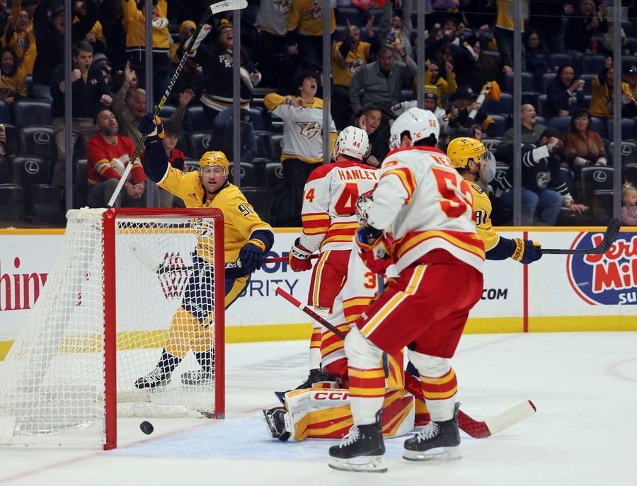 Predators strike for three in first, hold off Flames’ rally