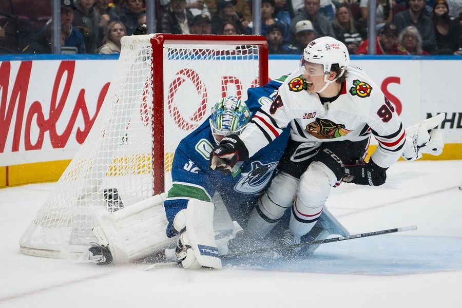 Blackhawks, Canucks aspire to more than playing out string