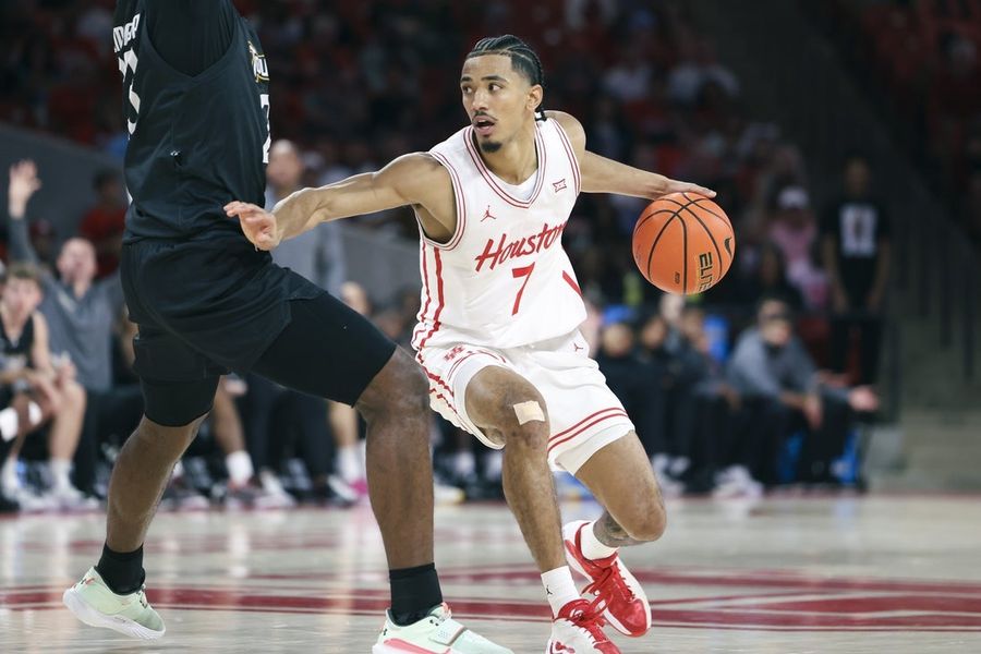 No. 2 Houston goes on late run, fends off Towson