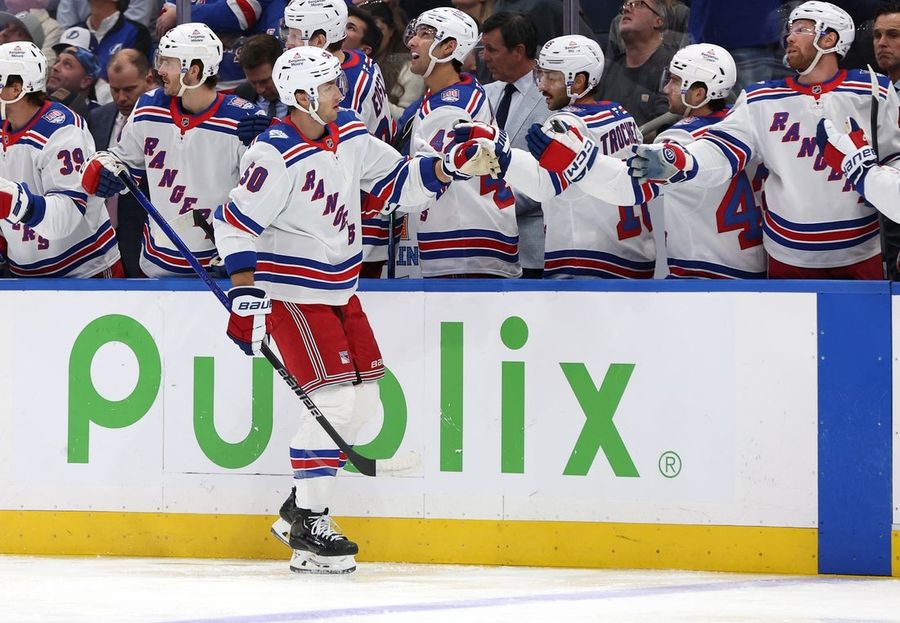 Game-opening barrage propels Rangers to rout of Lightning