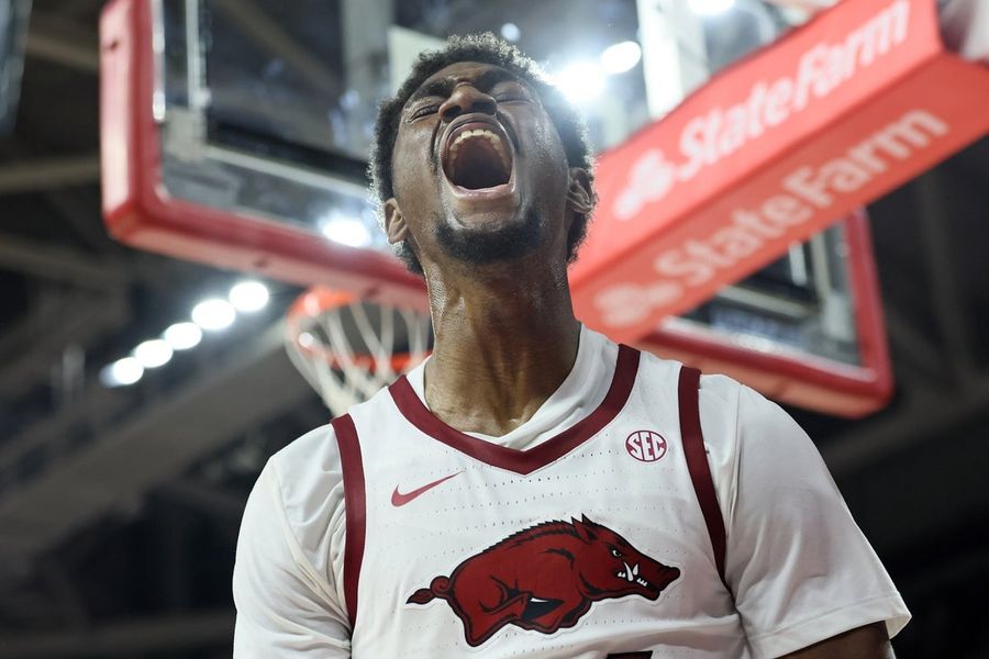 No. 25 Arkansas sends No. 6 Louisville to first defeat