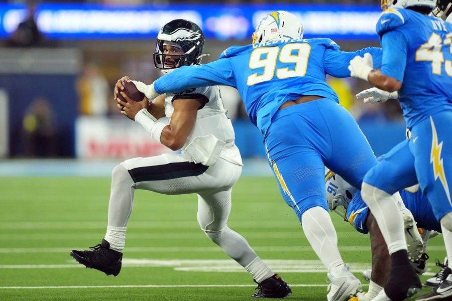 Chargers survive turnover fest to down Eagles in OT