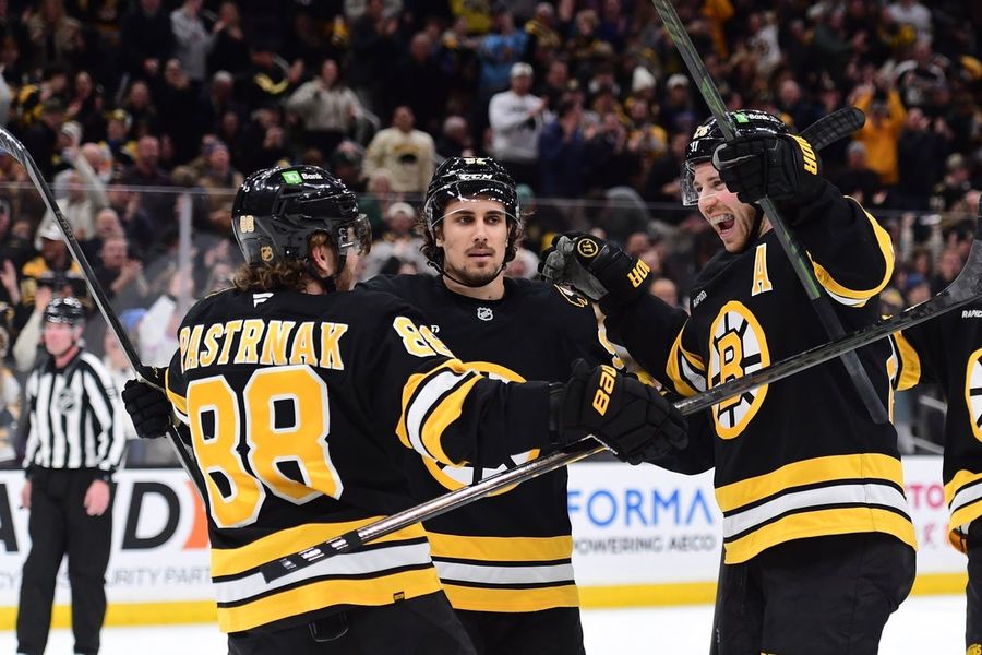 Bruins coast past Flames to begin homestand