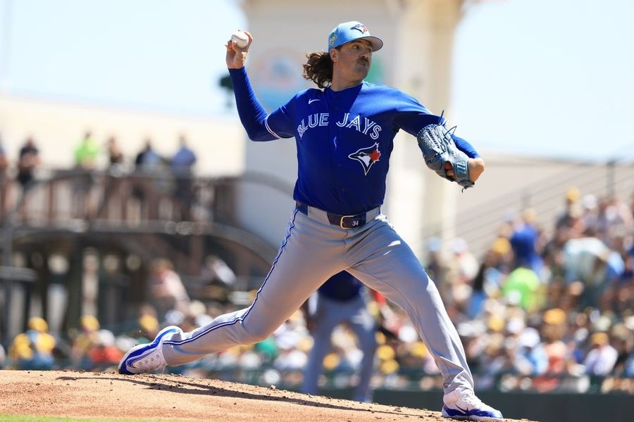 Blue Jays, downplaying 'defending' status, open against A's