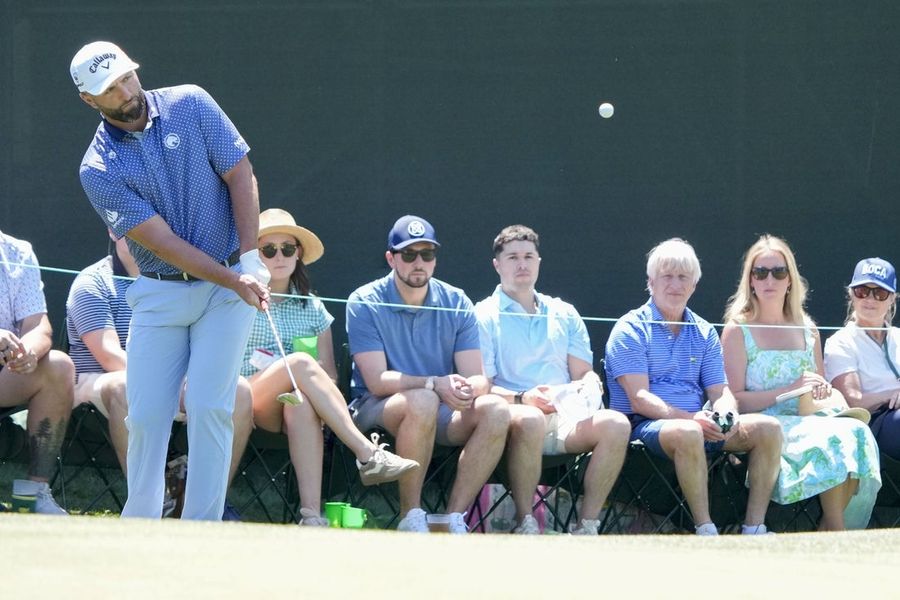 Deadspin | Jon Rahm 5-over through three rounds, on fringe of 50th at Masters Apr 11, 2026; Augusta, Georgia, USA; Jon Rahm chips onto the 14th green during the third round of the Masters Tournament at Augusta National Golf Club. Mandatory Credit: Kyle Terada-Imagn Images AUGUSTA, Ga. — Jon Rahm floundered to 50th on the Masters leaderboard and 5-over through 54 holes on Saturday with a scorecard lined with bogeys. Rahm was 17 shots back of leader and budding rival Rory McIlroy when the Spaniard bogeyed the 18th with his third five on a par-4 hole on the back nine on Saturday at Augusta National. “Well, the only thing about a weekend like today, once things are not going well enough, is you can start trying things just to see how it feels or how you can do it in competition, right?” Rahm said. “Just a bit of what I did today. Probably what I’ll do tomorrow. Hitting it on the range is one thing; doing it on the golf course is a different thing.” Rahm is tied with countryman and fellow LIV Golf circuit member Sergio Garcia entering the final round of the first major of the PGA Tour season. Rahm battled to make the cut following a first-round 78 with a 70 on Friday in the second. And the third round started with some promise. He birdied the first and third and sat 2-under before the third-round collapse as he carded a 73. The 2023 Masters champion said he was using the latter holes of the third round to work on parts of his game he wouldn’t otherwise attempt in a tournament setting. “Golf is golf,” he insisted when pressed about the challenge of transitioning to the Masters after spending the year to date in LIV competitions, where he had 17 top-five finishes in his first 30 events. Rahm has never won the PGA Championship, which is the next major — May 14-18 at Aronimink Golf Club — one month before the 126th U.S. Open Championship at Shinnecock Hills Golf Club. Rahm has two top-10 finishes in 10 career starts at the PGA Championship. He won the U.S. Open in 2021. Trophy form wasn’t visible often during his first three rounds at Augusta this week. Rahm said he has an idea why he didn’t have a great week at the Masters, but wouldn’t disclose the diagnosis. He did offer that it wouldn’t be a swing change, but might involve putting. “I’ll tell you one thing: My putting hasn’t been the best and I’ve been putting the line the last two days which I rarely ever do, right, just to help me a little bit,” he said. Bogeys on Saturday at No. 5, 11, 14 and 18 left Rahm with little shot at a 77th top 10 and even his 107th career Top 25 finish was going to take a stellar 18. Rahm said he was perhaps already “too far away” to make noise prior to Saturday. “I’m going to need an absolute miracle,” he said Friday. The miracle didn’t come, and Rahm might get the double-knuckle shot with McIlroy maintaining his sensational pace atop the leaderboard. McIlroy has been outspoken since the LIV Golf split from the PGA Tour and more recently in questioning Rahm’s resistance to meeting the stipulations of the DP World Tour requiring participation in events to be in consideration for the Ryder Cup. McIlroy said it’s “a really generous deal.” –Field Level Media #Deadspin #Jon #Rahm #5over #rounds #fringe #50th #Masters Deadspin | Jon Rahm 5-over through three rounds, on fringe of 50th at Masters Apr 11, 2026; Augusta, Georgia, USA; Jon Rahm chips onto the 14th green during the third round of the Masters Tournament at Augusta National Golf Club. Mandatory Credit: Kyle Terada-Imagn Images AUGUSTA, Ga. — Jon Rahm floundered to 50th on the Masters leaderboard and 5-over through 54 holes on Saturday with a scorecard lined with bogeys. Rahm was 17 shots back of leader and budding rival Rory McIlroy when the Spaniard bogeyed the 18th with his third five on a par-4 hole on the back nine on Saturday at Augusta National. “Well, the only thing about a weekend like today, once things are not going well enough, is you can start trying things just to see how it feels or how you can do it in competition, right?” Rahm said. “Just a bit of what I did today. Probably what I’ll do tomorrow. Hitting it on the range is one thing; doing it on the golf course is a different thing.” Rahm is tied with countryman and fellow LIV Golf circuit member Sergio Garcia entering the final round of the first major of the PGA Tour season. Rahm battled to make the cut following a first-round 78 with a 70 on Friday in the second. And the third round started with some promise. He birdied the first and third and sat 2-under before the third-round collapse as he carded a 73. The 2023 Masters champion said he was using the latter holes of the third round to work on parts of his game he wouldn’t otherwise attempt in a tournament setting. “Golf is golf,” he insisted when pressed about the challenge of transitioning to the Masters after spending the year to date in LIV competitions, where he had 17 top-five finishes in his first 30 events. Rahm has never won the PGA Championship, which is the next major — May 14-18 at Aronimink Golf Club — one month before the 126th U.S. Open Championship at Shinnecock Hills Golf Club. Rahm has two top-10 finishes in 10 career starts at the PGA Championship. He won the U.S. Open in 2021. Trophy form wasn’t visible often during his first three rounds at Augusta this week. Rahm said he has an idea why he didn’t have a great week at the Masters, but wouldn’t disclose the diagnosis. He did offer that it wouldn’t be a swing change, but might involve putting. “I’ll tell you one thing: My putting hasn’t been the best and I’ve been putting the line the last two days which I rarely ever do, right, just to help me a little bit,” he said. Bogeys on Saturday at No. 5, 11, 14 and 18 left Rahm with little shot at a 77th top 10 and even his 107th career Top 25 finish was going to take a stellar 18. Rahm said he was perhaps already “too far away” to make noise prior to Saturday. “I’m going to need an absolute miracle,” he said Friday. The miracle didn’t come, and Rahm might get the double-knuckle shot with McIlroy maintaining his sensational pace atop the leaderboard. McIlroy has been outspoken since the LIV Golf split from the PGA Tour and more recently in questioning Rahm’s resistance to meeting the stipulations of the DP World Tour requiring participation in events to be in consideration for the Ryder Cup. McIlroy said it’s “a really generous deal.” –Field Level Media #Deadspin #Jon #Rahm #5over #rounds #fringe #50th #Masters