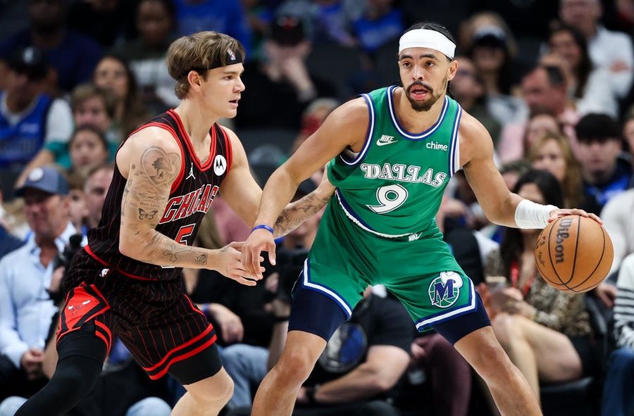 Deadspin | Ryan Nembhard totals 23 assists as Mavericks roll past Bulls Apr 12, 2026; Dallas, Texas, USA; Dallas Mavericks guard Ryan Nembhard (9) dribbles as Chicago Bulls guard Mac McClung (5) defends during the first half at American Airlines Center. Mandatory Credit: Kevin Jairaj-Imagn Images Ryan Nembhard notched the second-most assists in a game in Dallas history as the Mavericks defeated the visiting Chicago Bulls 149-128 on Sunday. Nembhard fell narrowly short of a triple-double in the season-ending clash, chalking up 15 points, nine rebounds and 23 assists. Only current Dallas coach Jason Kidd, with 25 assists in February 1996, has registered more for the Mavericks. John Poulakidas scored a career-best 28 points off the bench for Dallas (26-56), including 8 of 16 from 3-point range. Tyler Smith and AJ Johnson added 20 each for the Mavs, and Moussa Cisse paired 17 points with a career-high 20 boards. Cooper Flagg scored 10 points, his stellar rookie campaign ending with 10:11 left in the second quarter after spraining his left ankle on a bad landing while leaping for an offensive rebound. Rob Dillingham scored 25 for Chicago (31-51). Collin Sexton contributed 19, Leonard Miller had 17, and Lachlan Olbrich added a triple-double, finishing with 10 points, 15 rebounds and 10 assists. Dallas used a 16-0 burst to turn a brief 2-4 deficit into an 18-4 lead and never looked back. Flagg, Khris Middleton and Max Christie were all prolific as the Mavericks hit 15 of 23 from the floor in a first-quarter offensive blitz. Cisse threw down a powerful dunk to end the period with Dallas up 45-34. Smith scored 12 off the Mavericks’ bench in the second frame as the one-way traffic continued. Dallas dominated the quarter at both ends, 35-22, and held sway 80-56 at halftime. Dillingham was the only Bull to really offer resistance, contributing 10 in the second period for a 17-point half. Poulakidas caught fire after the long break, pouring in 22 points for the third quarter, including 6 of 9 from deep. Behind the rookie’s perimeter shooting, Dallas stormed ahead 115-81 and led 119-88 with one to play, despite Flagg, Middleton and Christie all sitting out the entire second half. The Bulls saved some face in the fourth quarter, in which they outscored the Mavericks 40-30. –Field Level Media #Deadspin #Ryan #Nembhard #totals #assists #Mavericks #roll #Bulls Deadspin | Ryan Nembhard totals 23 assists as Mavericks roll past Bulls Apr 12, 2026; Dallas, Texas, USA; Dallas Mavericks guard Ryan Nembhard (9) dribbles as Chicago Bulls guard Mac McClung (5) defends during the first half at American Airlines Center. Mandatory Credit: Kevin Jairaj-Imagn Images Ryan Nembhard notched the second-most assists in a game in Dallas history as the Mavericks defeated the visiting Chicago Bulls 149-128 on Sunday. Nembhard fell narrowly short of a triple-double in the season-ending clash, chalking up 15 points, nine rebounds and 23 assists. Only current Dallas coach Jason Kidd, with 25 assists in February 1996, has registered more for the Mavericks. John Poulakidas scored a career-best 28 points off the bench for Dallas (26-56), including 8 of 16 from 3-point range. Tyler Smith and AJ Johnson added 20 each for the Mavs, and Moussa Cisse paired 17 points with a career-high 20 boards. Cooper Flagg scored 10 points, his stellar rookie campaign ending with 10:11 left in the second quarter after spraining his left ankle on a bad landing while leaping for an offensive rebound. Rob Dillingham scored 25 for Chicago (31-51). Collin Sexton contributed 19, Leonard Miller had 17, and Lachlan Olbrich added a triple-double, finishing with 10 points, 15 rebounds and 10 assists. Dallas used a 16-0 burst to turn a brief 2-4 deficit into an 18-4 lead and never looked back. Flagg, Khris Middleton and Max Christie were all prolific as the Mavericks hit 15 of 23 from the floor in a first-quarter offensive blitz. Cisse threw down a powerful dunk to end the period with Dallas up 45-34. Smith scored 12 off the Mavericks’ bench in the second frame as the one-way traffic continued. Dallas dominated the quarter at both ends, 35-22, and held sway 80-56 at halftime. Dillingham was the only Bull to really offer resistance, contributing 10 in the second period for a 17-point half. Poulakidas caught fire after the long break, pouring in 22 points for the third quarter, including 6 of 9 from deep. Behind the rookie’s perimeter shooting, Dallas stormed ahead 115-81 and led 119-88 with one to play, despite Flagg, Middleton and Christie all sitting out the entire second half. The Bulls saved some face in the fourth quarter, in which they outscored the Mavericks 40-30. –Field Level Media #Deadspin #Ryan #Nembhard #totals #assists #Mavericks #roll #Bulls