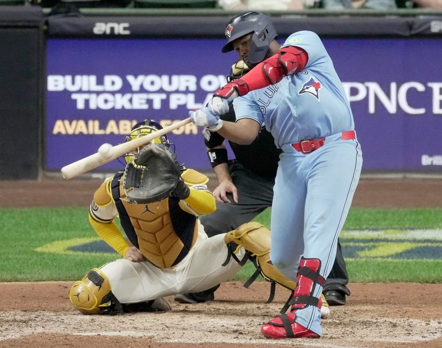 Deadspin | Jays rally in 9th, hold off Brewers in 10th in wild win Toronto Blue Jays first baseman Vladimir Guerrero Jr. (27) hits an RBI double during the tenth inning of their game against the Milwaukee Brewers Tuesday, April 14, 2026 at American Family Field in Milwaukee, Wisconsin. Myles Straw’s two-run double capped a three-run 10th inning as the visiting Toronto Blue Jays rallied for a 9-7 victory over Milwaukee on Tuesday night, the Brewers’ sixth consecutive defeat. Toronto scored three runs in the ninth to go up 6-4, but the Brewers tied it with two in the bottom half. Vladimir Guerrero Jr.’s one-out double in the 10th off Grant Anderson (0-1) scored automatic runner Ernie Clement from second to put Toronto up 7-6. Jesse Sanchez was walked intentionally and both runners scored on Straw’s liner to left. Louis Varland (1-1), who relieved with two outs in the ninth and struck out Joey Ortiz to strand the bases loaded, got the win despite allowing a run in the 10th on William Contreras’ RBI single. Varland stranded runners on first and second with a game-ending strikeout of Gary Sanchez. The Brewers sent it to extra innings with two in the bottom of the ninth off Jeff Hoffman on an RBI single by Brice Turang and Brandon Lockridge’s two-out RBI double. Toronto scored three in the ninth off struggling closer Trevor Megill on an RBI single by Kazuma Okamoto, a run-scoring groundout by Andres Gimenez and an RBI single by Clement for a 6-4 lead. Sanchez put the Brewers up 4-2 with his fifth homer, a two-out solo shot in the seventh. Toronto pulled within 4-3 in the eighth on an RBI groundout by Guerrero. Bauers snapped a scoreless tie with a three-run homer in the fourth off starter Kevin Gausman. Turang singled to open and Sanchez walked. Bauers followed with his fifth homer, sending a 1-1 pitch 418 feet to left-center. Gausman was charged with three runs on six hits in five innings, with three walks and five strikeouts. Gimenez got one back for the Blue Jays in the fifth with his third homer, a two-out shot off Jacob Misiorowski. Misiorowski yielded two runs in 5 ? innings, giving up five hits with five strikeouts and no walks. Varsho, who played collegiately at nearby Wisconsin-Milwaukee, brought the Blue Jays within 3-2 with another solo homer, his third, with one out in the sixth. –Field Level Media #Deadspin #Jays #rally #9th #hold #Brewers #10th #wild #win Deadspin | Jays rally in 9th, hold off Brewers in 10th in wild win Toronto Blue Jays first baseman Vladimir Guerrero Jr. (27) hits an RBI double during the tenth inning of their game against the Milwaukee Brewers Tuesday, April 14, 2026 at American Family Field in Milwaukee, Wisconsin. Myles Straw’s two-run double capped a three-run 10th inning as the visiting Toronto Blue Jays rallied for a 9-7 victory over Milwaukee on Tuesday night, the Brewers’ sixth consecutive defeat. Toronto scored three runs in the ninth to go up 6-4, but the Brewers tied it with two in the bottom half. Vladimir Guerrero Jr.’s one-out double in the 10th off Grant Anderson (0-1) scored automatic runner Ernie Clement from second to put Toronto up 7-6. Jesse Sanchez was walked intentionally and both runners scored on Straw’s liner to left. Louis Varland (1-1), who relieved with two outs in the ninth and struck out Joey Ortiz to strand the bases loaded, got the win despite allowing a run in the 10th on William Contreras’ RBI single. Varland stranded runners on first and second with a game-ending strikeout of Gary Sanchez. The Brewers sent it to extra innings with two in the bottom of the ninth off Jeff Hoffman on an RBI single by Brice Turang and Brandon Lockridge’s two-out RBI double. Toronto scored three in the ninth off struggling closer Trevor Megill on an RBI single by Kazuma Okamoto, a run-scoring groundout by Andres Gimenez and an RBI single by Clement for a 6-4 lead. Sanchez put the Brewers up 4-2 with his fifth homer, a two-out solo shot in the seventh. Toronto pulled within 4-3 in the eighth on an RBI groundout by Guerrero. Bauers snapped a scoreless tie with a three-run homer in the fourth off starter Kevin Gausman. Turang singled to open and Sanchez walked. Bauers followed with his fifth homer, sending a 1-1 pitch 418 feet to left-center. Gausman was charged with three runs on six hits in five innings, with three walks and five strikeouts. Gimenez got one back for the Blue Jays in the fifth with his third homer, a two-out shot off Jacob Misiorowski. Misiorowski yielded two runs in 5 ? innings, giving up five hits with five strikeouts and no walks. Varsho, who played collegiately at nearby Wisconsin-Milwaukee, brought the Blue Jays within 3-2 with another solo homer, his third, with one out in the sixth. –Field Level Media #Deadspin #Jays #rally #9th #hold #Brewers #10th #wild #win