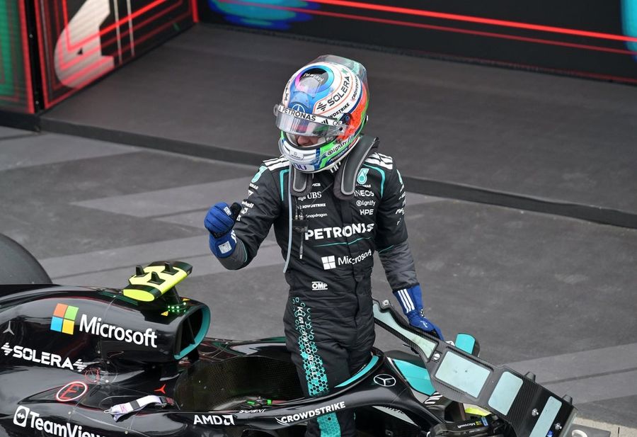 Kimi Antonelli holds off Charles Leclerc to win Belgian GP